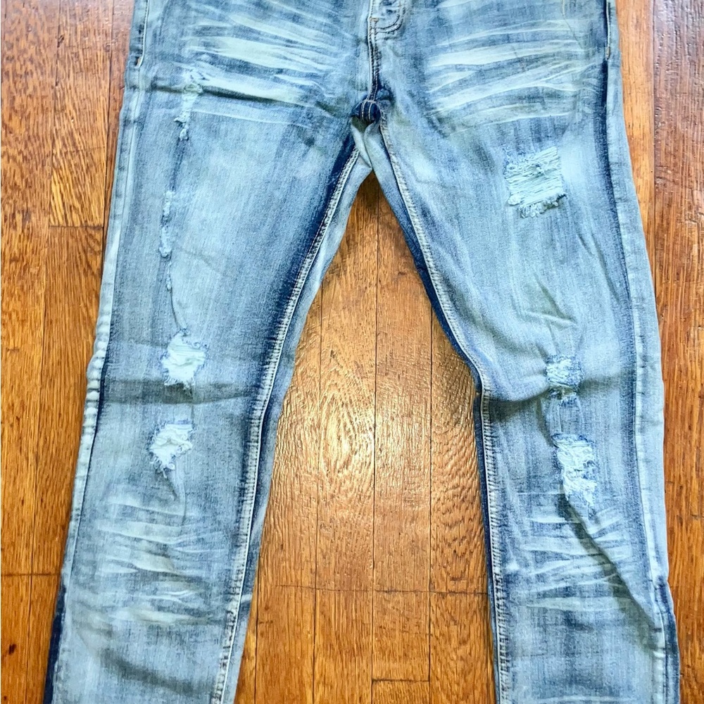Distressed Light Blue Jeans